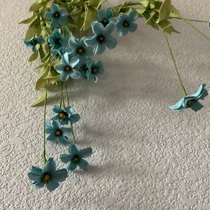 Faux blue flowers